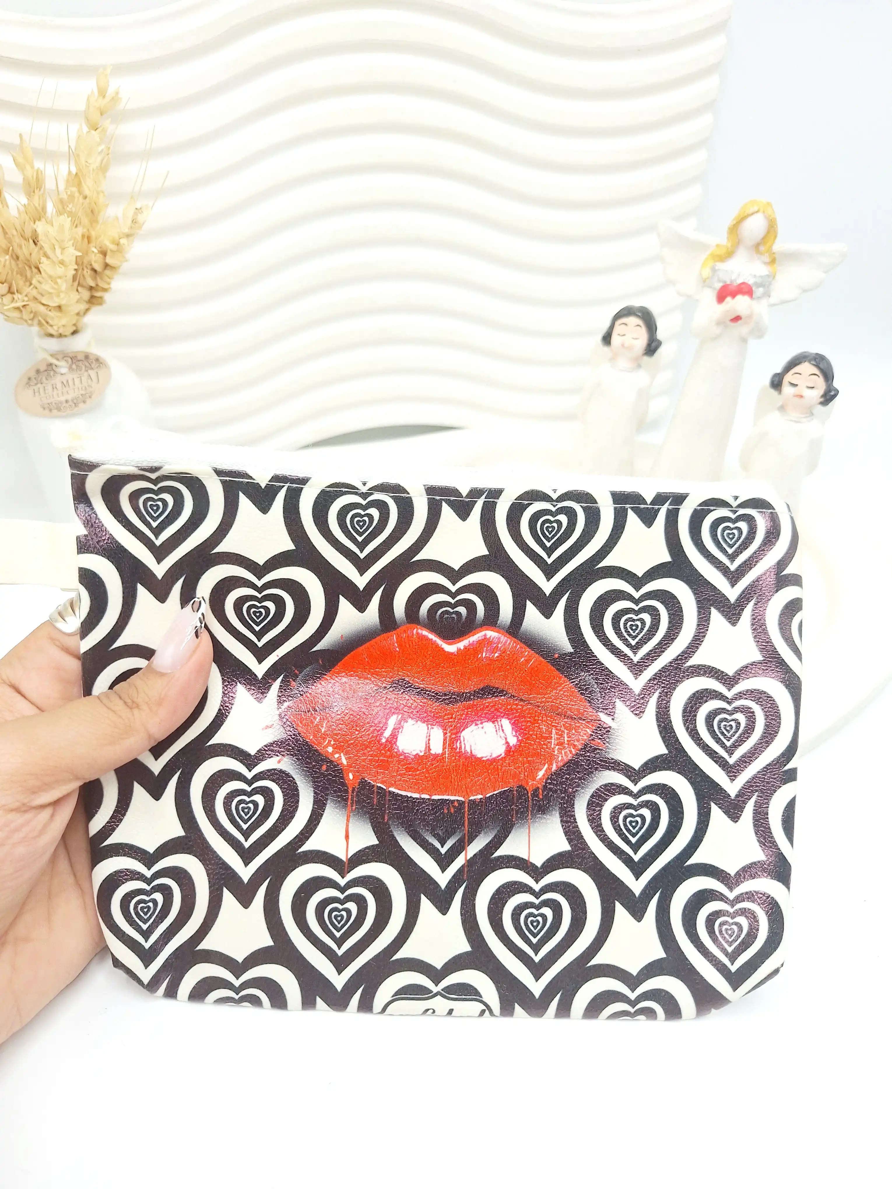 کیف لوازم آرایشی طرح دار چرمی ارسال به صورت رندم